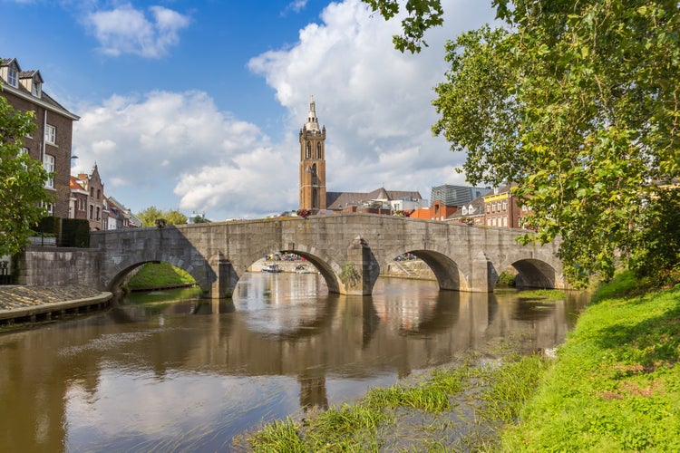 Church tower and historic bridge in Roermond, Netherlands