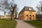 photo of view of The Reithaus at Park an der Ilm with City Castle of Weimar in background, Weimar, Germany.