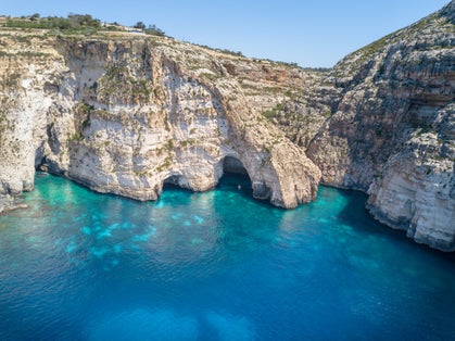 Photo of beautiful Blue Grotto caves and cliff in Malta.