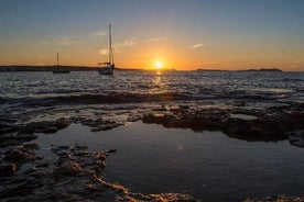 Spedizione catamarano al tramonto davanti al Cafe Mambo