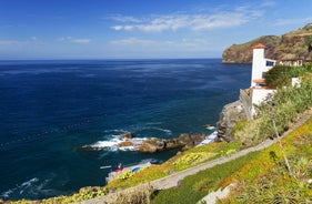 Photo of beach aerial view of Machico bay and Cristiano Ronaldo International airport in Madeira, Portugal.