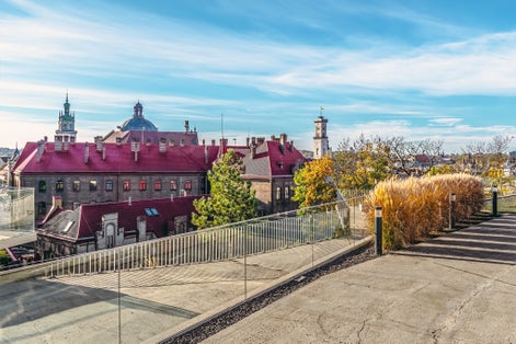 Photo of view from the observation deck of the Memorial to the Heavenly Hundred Heroes to the red tiled roof of the old Fire Station in Lviv, Ukraine.