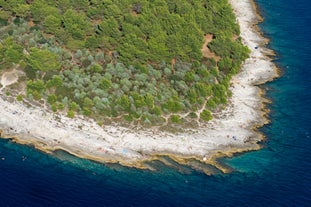 Photo of aerial view of beautiful town of Medulin waterfront view, Istria region of Croatia.