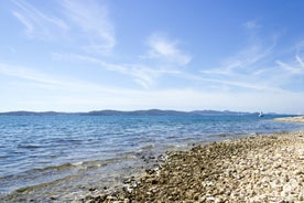 photo of a beautiful panoramic view of Kastel Luksic harbor and landmarks summer view, Split region of Dalmatia, Croatia.