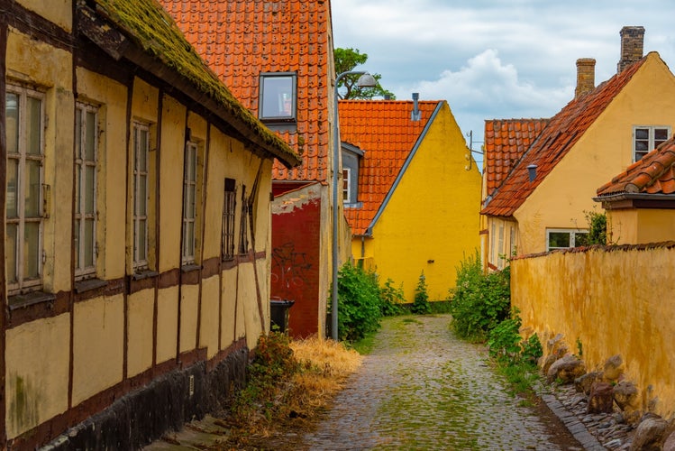 photo of view of  Colorful street at center of Stege, Denmark.