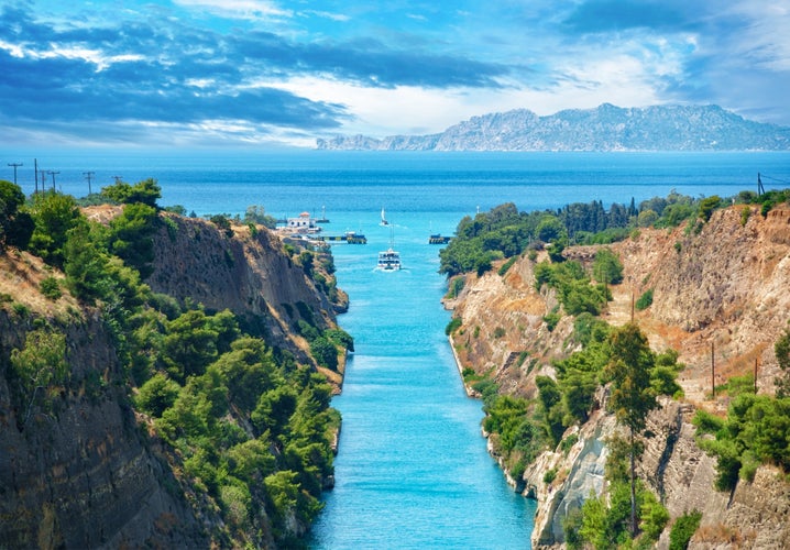 Photo of scenic landscape of the Corinth Canal in a bright sunny day against a blue sky ,Greece.