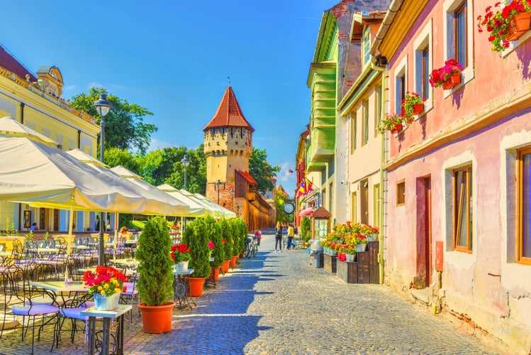 Little square and The Carpenters' Tower in Sibiu city, Transylvania region, Romania.