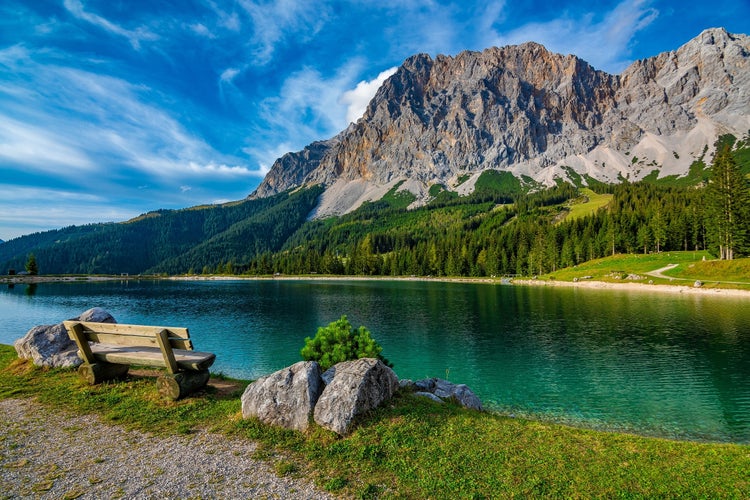 photo of a beautiful view on the Ehrwalder Almsee and the Zugspitze on a sunny summer day in Austria, September 2018.