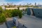 Warsaw, Poland - May 13, 2023: Elevated view of the Museum of History of Polish Jews 'Polin', in Warsaw, with Ghetto Heroes Monument and people.