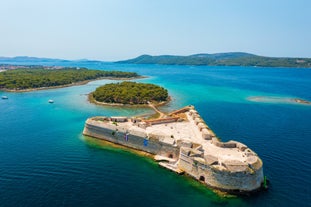 Photo of aerial view of Brodarica village near Sibenik beach and coastline, Dalmatia region of Croatia.