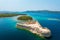 Photo of aerial view about St. Nicholas Fortress (Croatian: Tvrđava sv. Nikole) which is located at the entrance to St. Anthony Channel, near the town of Šibenik in central Dalmatia, Croatia.