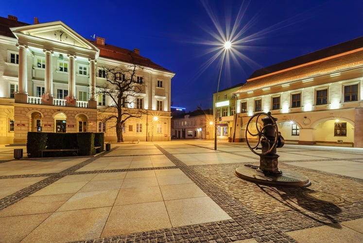 photo of City Hall in main square Rynek of Kielce, Poland Europe, in the evening.