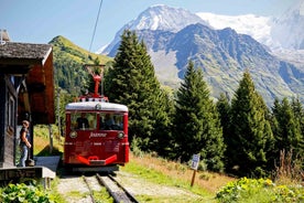 Photo of The winter view on the montains and ski lift station in French Alps near Chamonix Mont-Blanc.