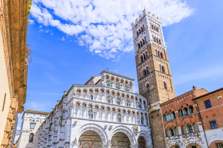 photo of view of Lucca, Italy. Façade and bell tower of Lucca Cathedral.