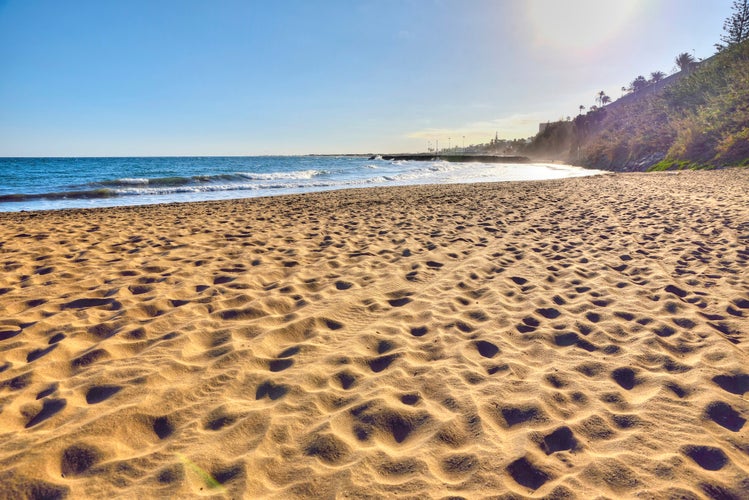 Photo of beautiful sandy beach Playa del Ingles, Maspalomas, Gran Canaria, Spain.