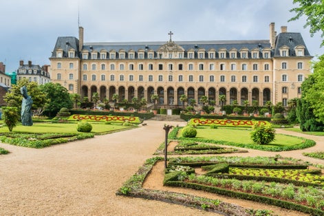 Photo of Saint George Palace (Palais Saint-Georges) in French garden is an historic building in the city of Rennes.