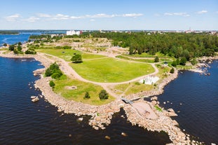 Photo of aerial view of beautiful landscape of lakes and forest in Imatra, Finland.