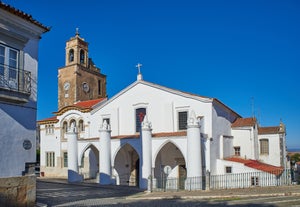 Photo of Carvoeiro fishing village with beautiful beach and colourful houses, Portugal.