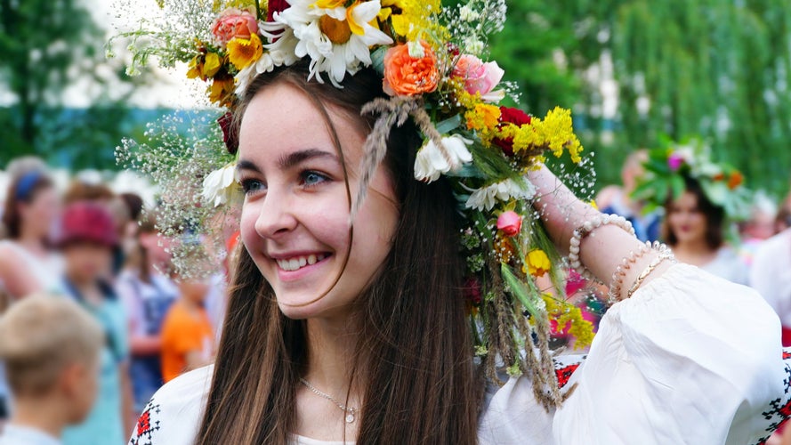 beautiful-young-girl-in-a-wreath-of-flowers-2023-11-27-04-56-55-utc.jpg