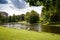 photo of view of Leopold park with pond, birds and people in Brussels, Belgium.