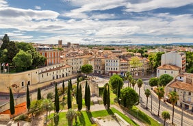 Photo of Nimes Arena aerial panoramic view. Nimes is a city in the Occitanie region of southern France.