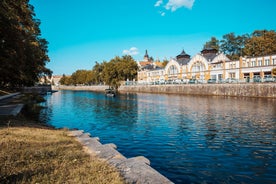 Photo of Lednice Chateau with beautiful gardens and parks on a sunny summer day, Czech Republic.