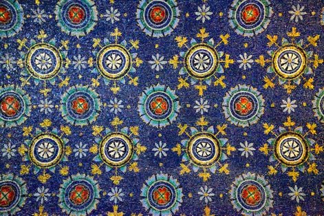 photo of view of Ancient mosaics (V century) on a ceiling in the Mausoleum of Galla Placidia in Ravenna, Italy.