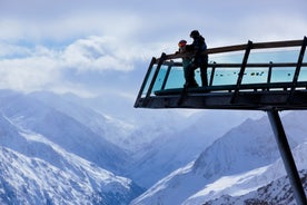 Photo of The mountain village at the Austrian ski resort Soelden on a cold and sunny winter day.