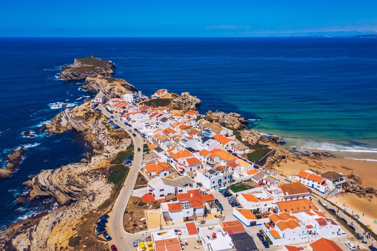 Photo of aerial view of island Baleal naer Peniche on the shore of the ocean in west coast of Portugal.