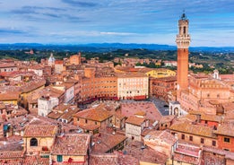 Aerial panoramic cityscape of Rome, Italy, Europe. Roma is the capital of Italy. Cityscape of Rome in summer. Rome roofs view with ancient architecture in Italy. 