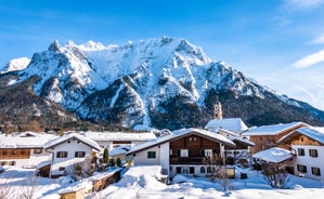 Photo of loisach river flowing through garmisch-partenkirchen, idyllic winter landscape bavaria.