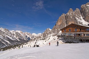 photo of the romantic, Snow covered Skiing Resort of Cortina d Ampezzo in the Italian Dolomites seen from Tofana with Col Druscie in the foreground.