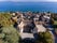 photo of aerial view of Château de Coppet and its surroundings in Vaud, Switzerland.