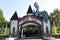 Entrance to Children's world park in Bucharest. Fantasy gate with guarded by a blue dragon.