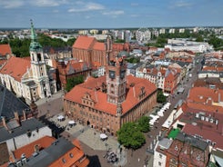 Photo of aerial view of Torun old town with Vistula river, Poland.