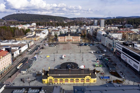 Photo of scene of Kuopio Market Square, with locals and visitors, in Kuopio, Finland.