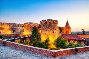 Antique building view in Old Town Bucharest city - capital of Romania and Dambrovita river. Bucharest, Romania, Europe.