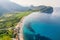 Photo of sea and sky with boats, rocks, a bright sunny day, clear water blue sea at Petrovac Buljarica beach, Montenegro.