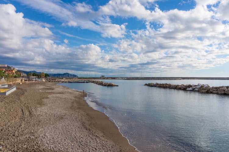 view of the barrier of the beach, and panorama of Tigullio coast, Chiavari, Italy