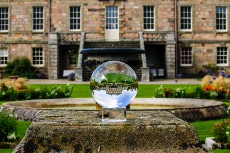 Photo of Haddo house through a lens ball,Scotland .