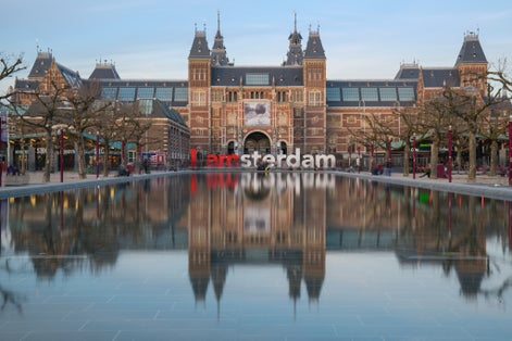 photo of Amsterdam Museum (Rijksmuseum) with I Amsterdam sign, Netherlands.