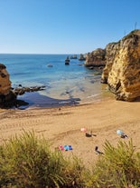 Photo of panoramic aerial view of Praia da Luz in municipality of Luz in Algarve, Portugal.