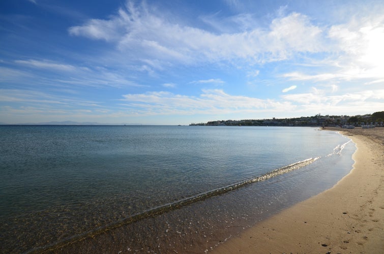 Photo of beautiful Didim beach with blue sky.