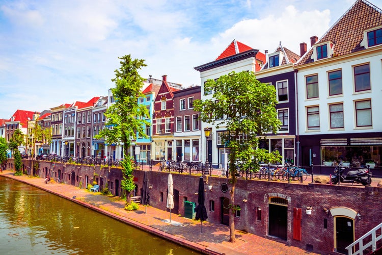 photo of view of This photo captures the serene and picturesque landscape of Utrecht, Netherlands. Featuring charming canals, historic architecture, and lush greenery, Utrecht offers a perfect blend of natural beauty