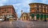 photo of Piazza del Duomo and Via dei Mercanti in the Morning, Milan, Italy .