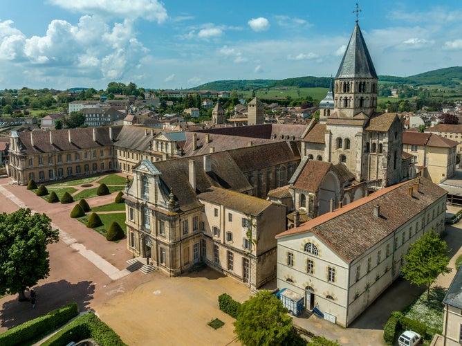 Photo of Aerial view of the Cluny Abbey a former Benedictine monastery in Romanesque architectural style in Cluny, Saône-et-Loire, France dedicated to Saint Peter.