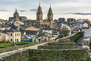 Photo of Facade of Santiago de Compostela cathedral in Obradoiro square, Spain.