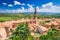 Photo of panorama of Saint-Saturnin-les-Apt, France, with tower and building of the St. Etienne church.