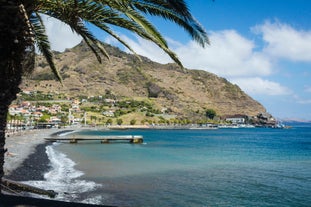 Photo of panoramic aerial view of idyllic coastal village of Porto da Cruz Madeira island, Portugal.