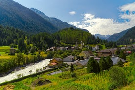 Photo of  beautiful Scuol town in Swiss Alps and Inn river, Switzerland.